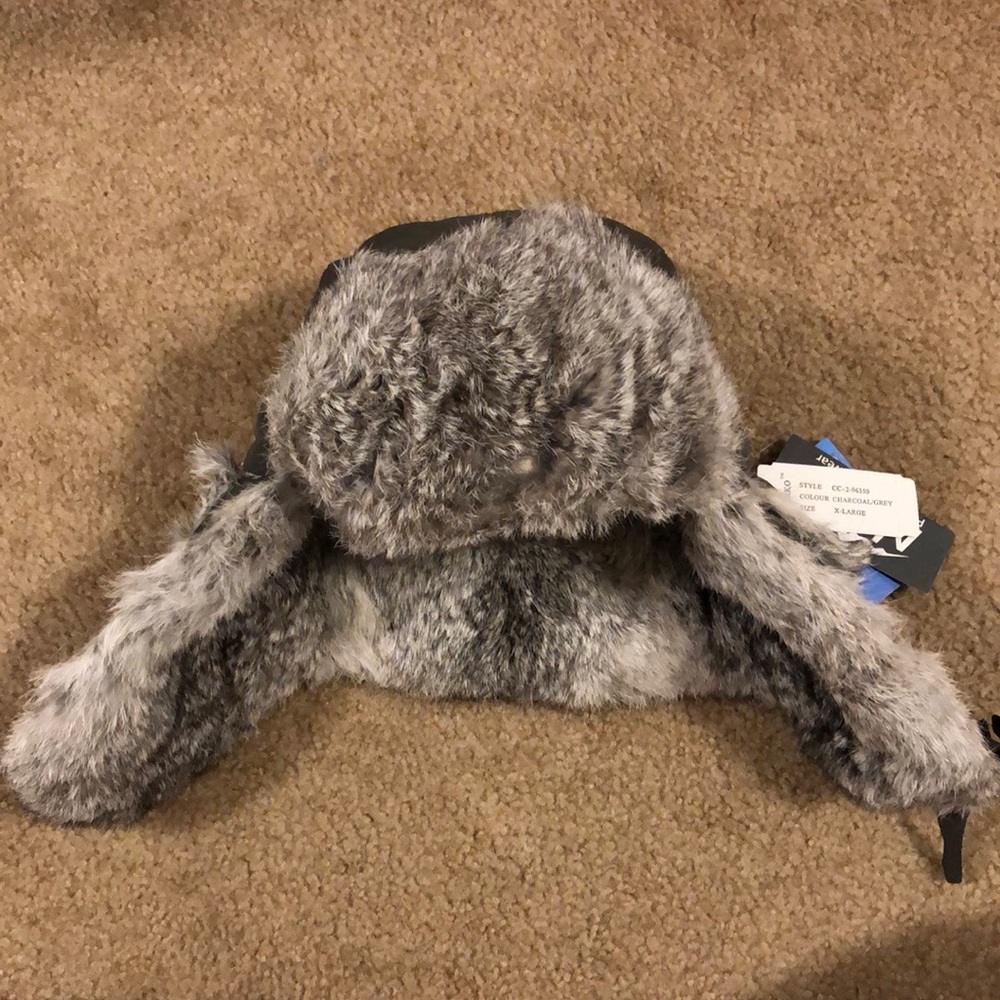 Norko shearling hat with ear flaps. Size xl